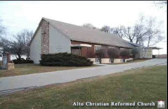 Alto Christian Reformed Church building, a brick and siding church with a cross